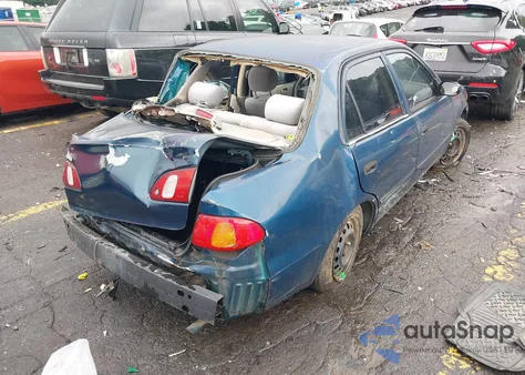 1999 Toyota Corolla Ce z USA, uszkodzony, nr VIN 1NXBR12E8XZ298678